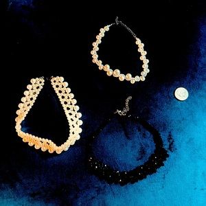 Faux pearl and black beads chokers.